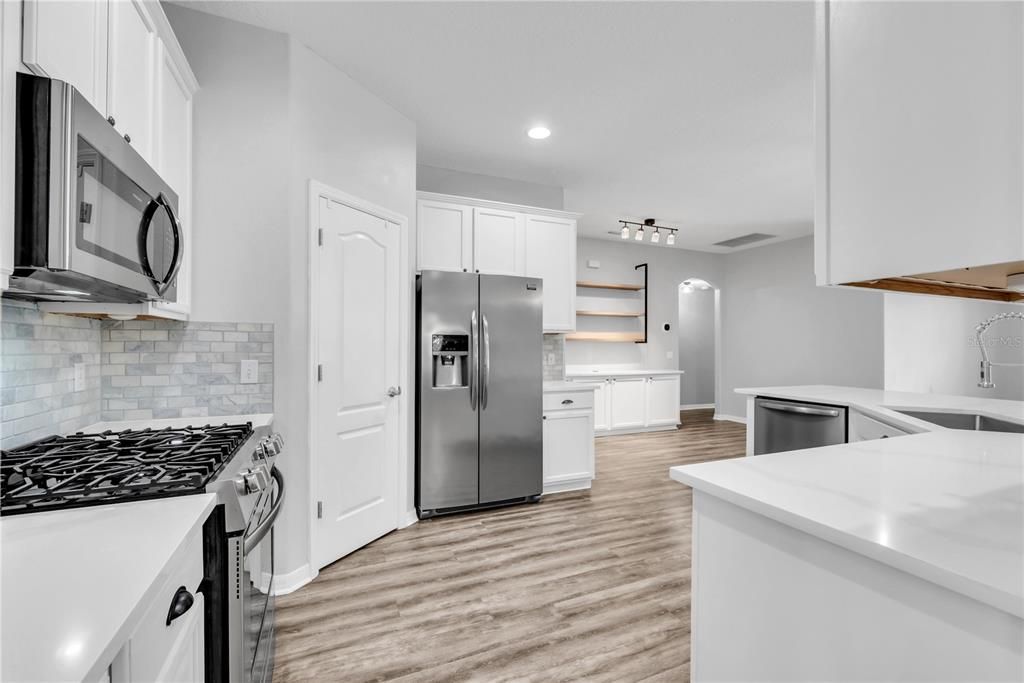 Interior, Kitchen, Recessed Lighting, Stainless Steel Appliances, Wood Texture Flooring