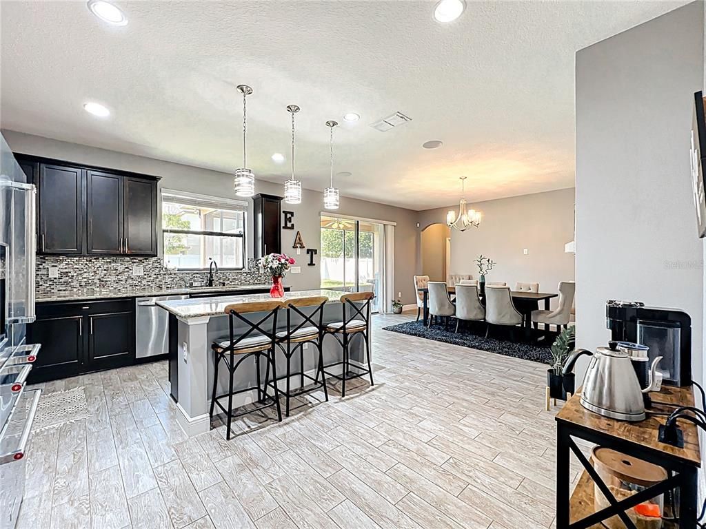 Chandelier, Dining room, Interior, Kitchen, Pendant Lights, Recessed Lighting, Wood Texture Flooring