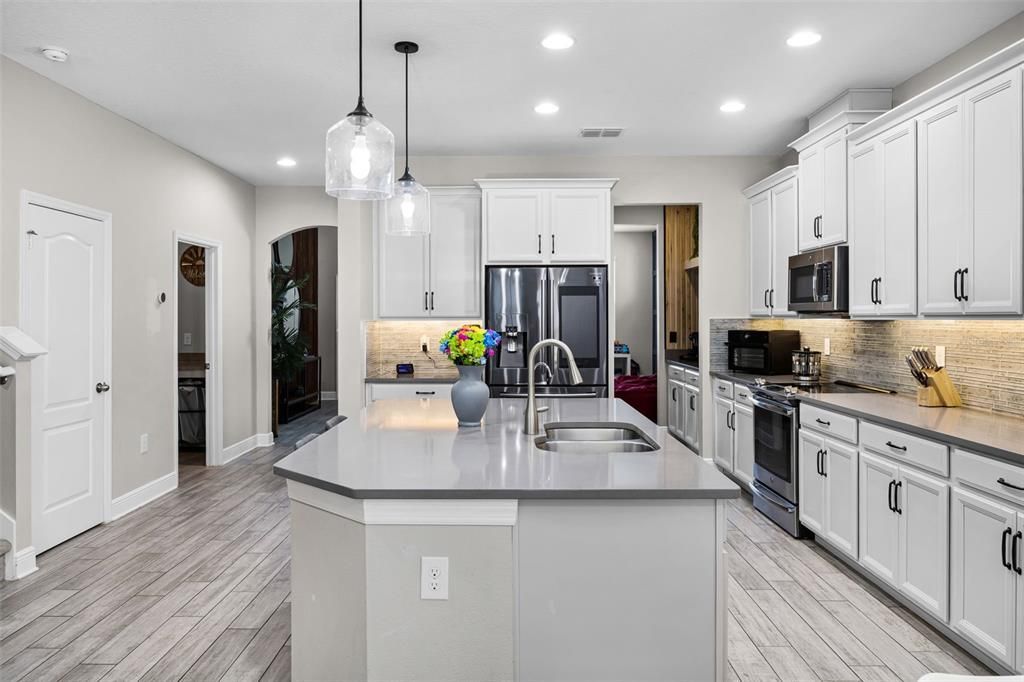 Interior, Kitchen, Pendant Lights, Recessed Lighting, Stainless Steel Appliances, Wood Texture Flooring