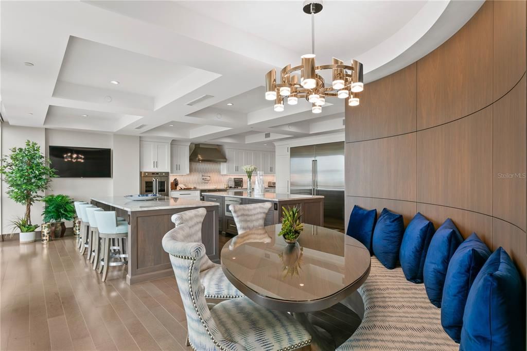 Chandelier, Dining room, Interior, Kitchen, Pendant Lights, Recessed Lighting, Stainless Steel Appliances, Wood Texture Flooring
