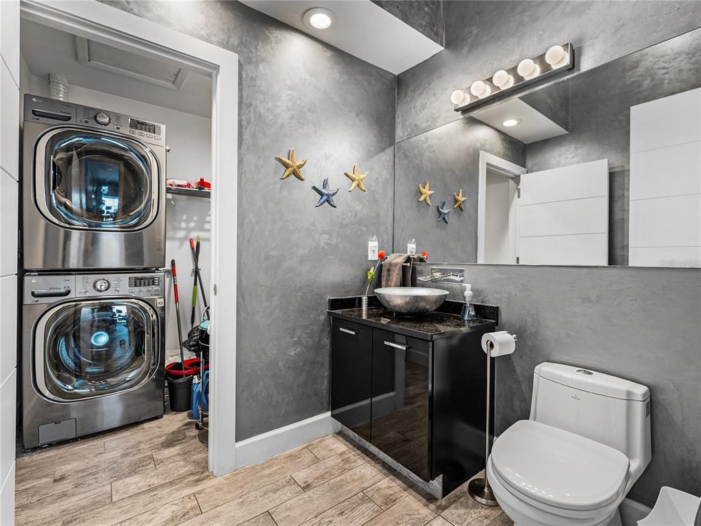 Bathroom, Interior, Recessed Lighting, Utility Closets, Washer, Wood Texture Flooring