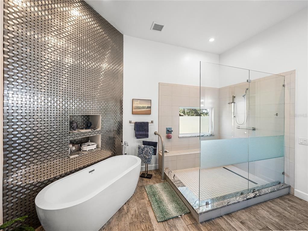 Bathroom, Free Standing Baths, Glass Shower, Interior, Recessed Lighting, Wood Texture Flooring