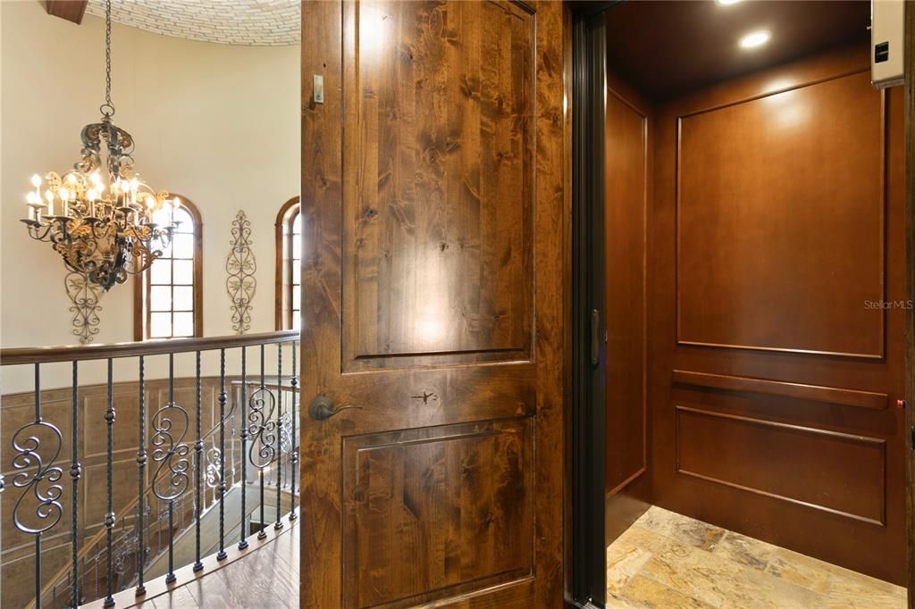 Chandelier, Elevator, Interior, Pendant Lights, Recessed Lighting, Wooden Walls