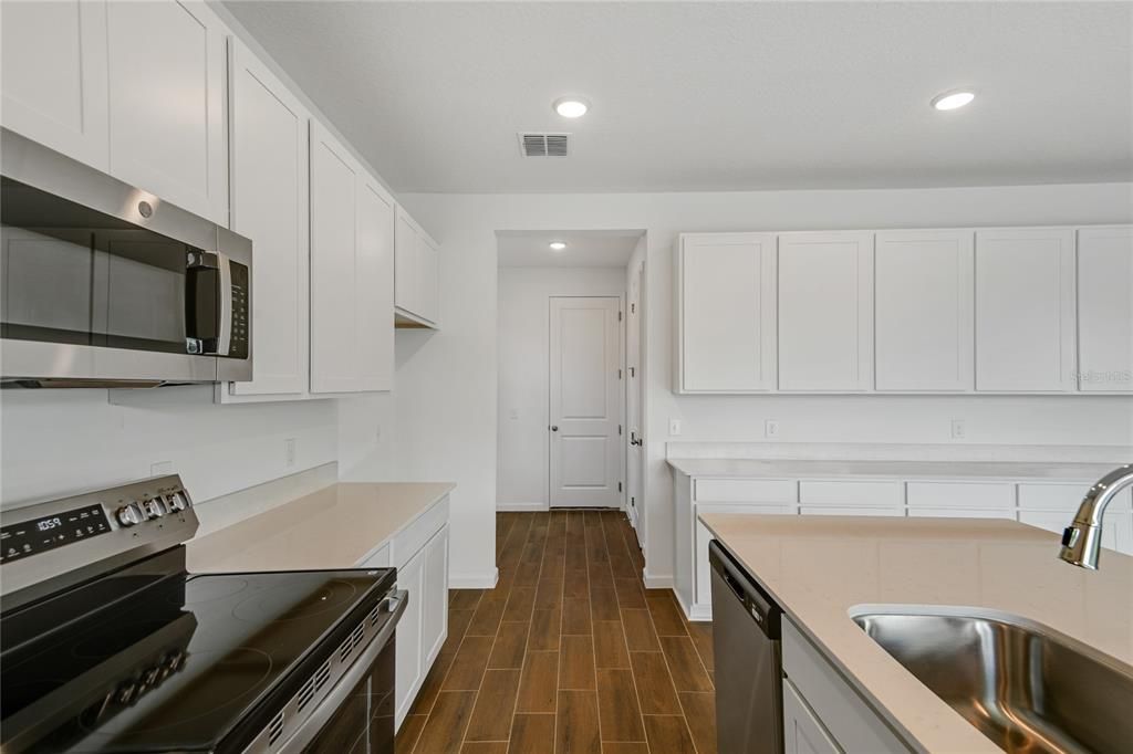 Interior, Kitchen, Recessed Lighting, Stainless Steel Appliances, Wood Texture Flooring