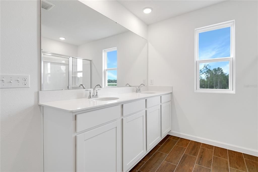 Bathroom, Dual Sink Vanities, Interior, Recessed Lighting, Wood Texture Flooring
