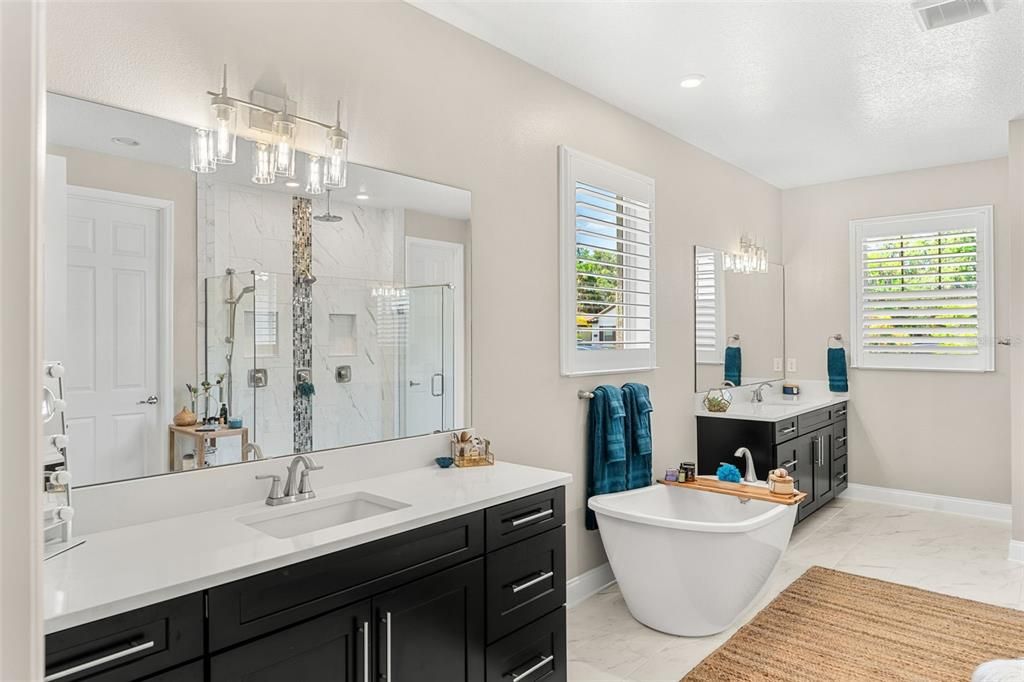 Bathroom, Dual Sink Vanities, Free Standing Baths, Interior, Marble, Marble Walls, Recessed Lighting