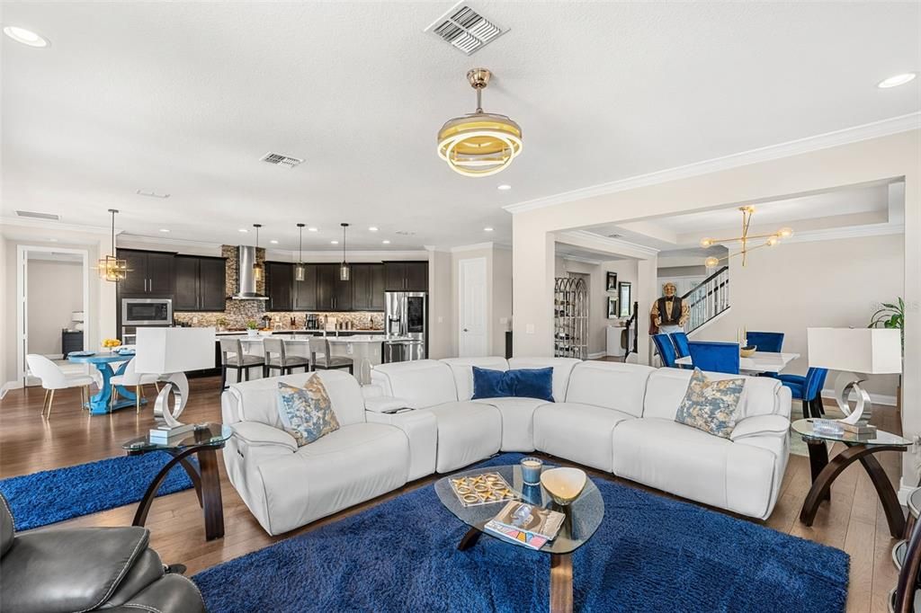 Dining room, Interior, Kitchen, Living room, Pendant Lights, Recessed Lighting, Stainless Steel Appliances, Wood Texture Flooring
