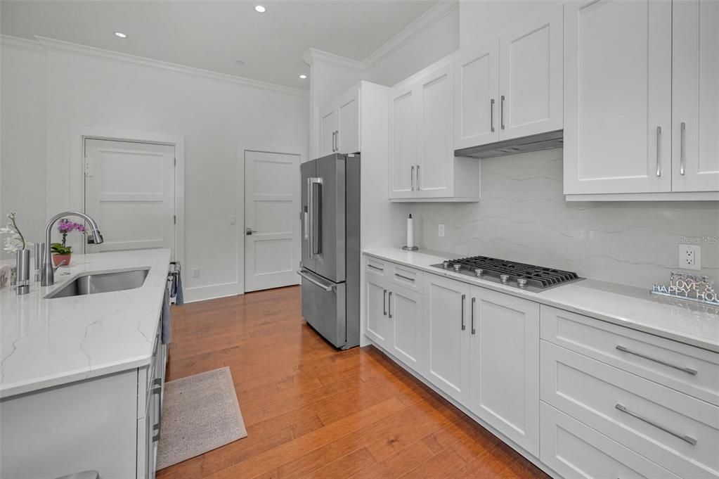 Interior, Kitchen, Marble Walls, Recessed Lighting, Wood Texture Flooring