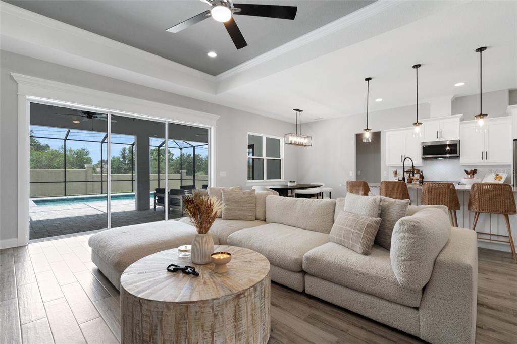 Dining room, Interior, Kitchen, Living room, Pendant Lights, Recessed Lighting, Stainless Steel Appliances, Wood Texture Flooring