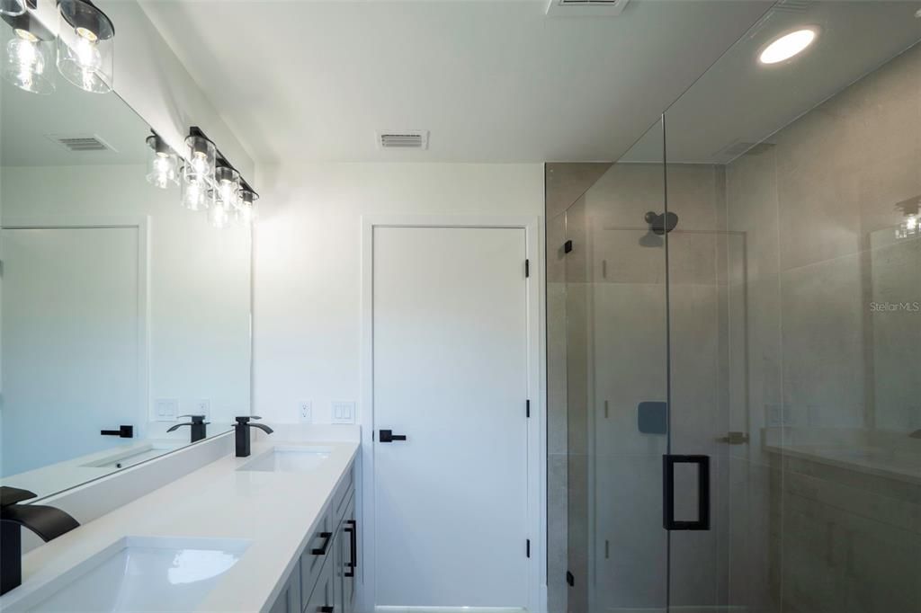 Bathroom, Dual Sink Vanities, Glass Shower, Interior, Recessed Lighting