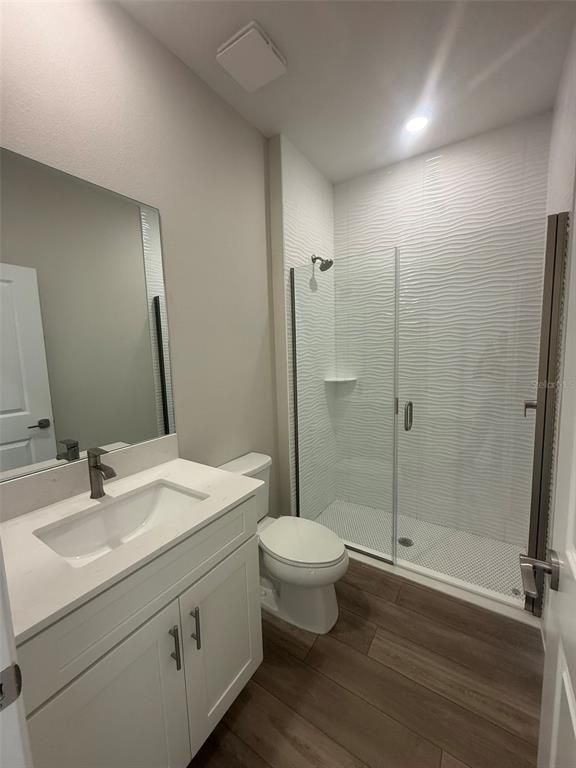 Bathroom, Glass Shower, Interior, Recessed Lighting, Wood Texture Flooring