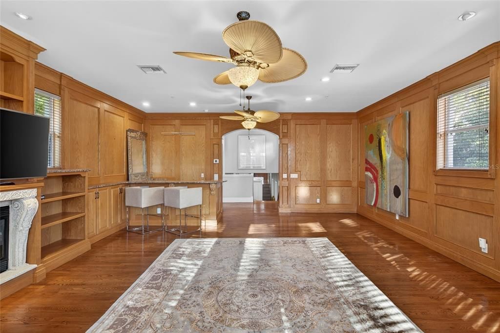 Fireplace, Interior, Kitchen, Recessed Lighting, Wood Texture Flooring, Wooden Walls