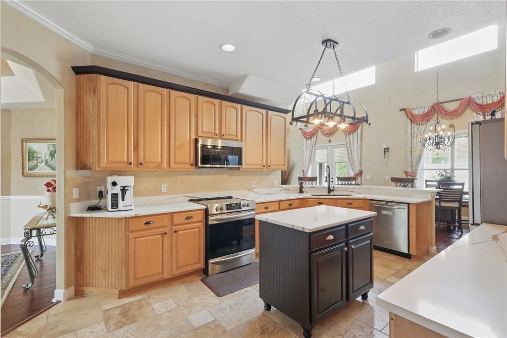 Chandelier, Dining room, Interior, Kitchen, Pendant Lights, Recessed Lighting, Stainless Steel Appliances