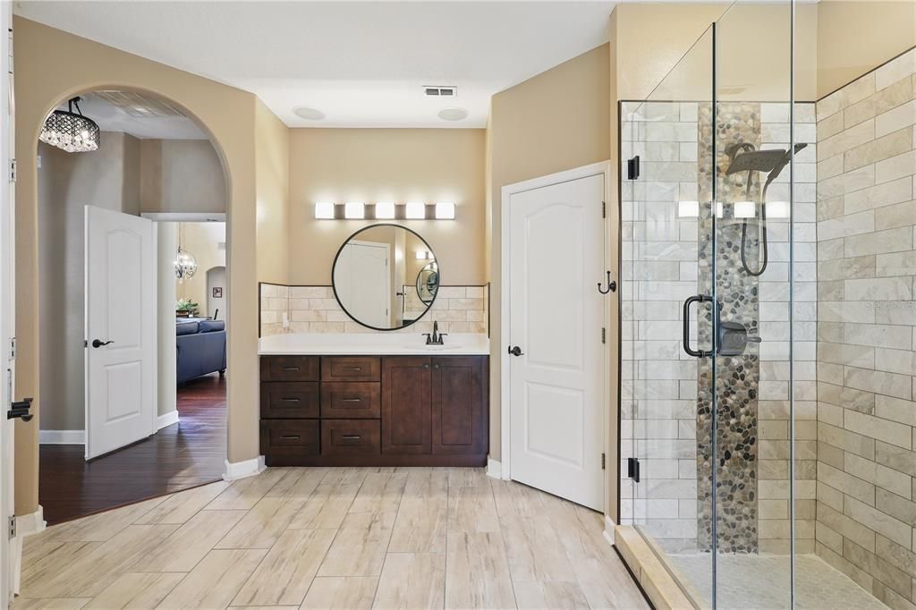 Bathroom, Glass Shower, Interior, Stone Walls, Wood Texture Flooring