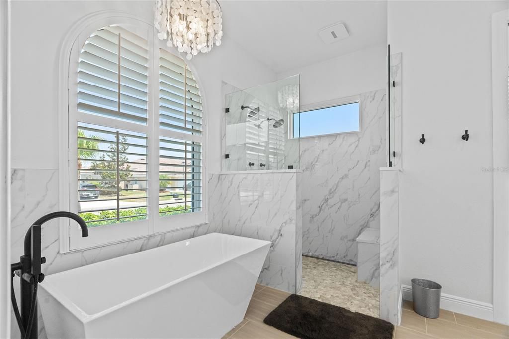 Bathroom, Chandelier, Free Standing Baths, Glass Shower, Interior, Marble Walls, Wood Texture Flooring
