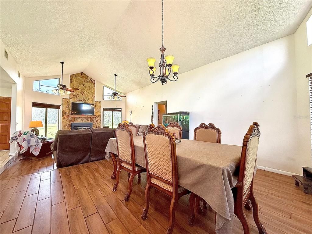 Chandelier, Dining room, Fireplace, Interior, Living room, Wood Texture Flooring