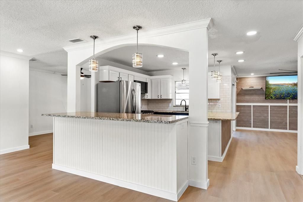 Interior, Kitchen, Pendant Lights, Recessed Lighting, Stainless Steel Appliances, Wood Texture Flooring