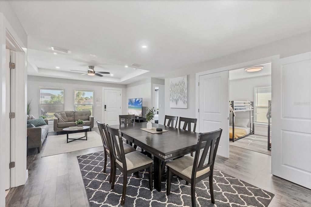 Dining room, Interior, Living room, Recessed Lighting, Stainless Steel Appliances, Wood Texture Flooring