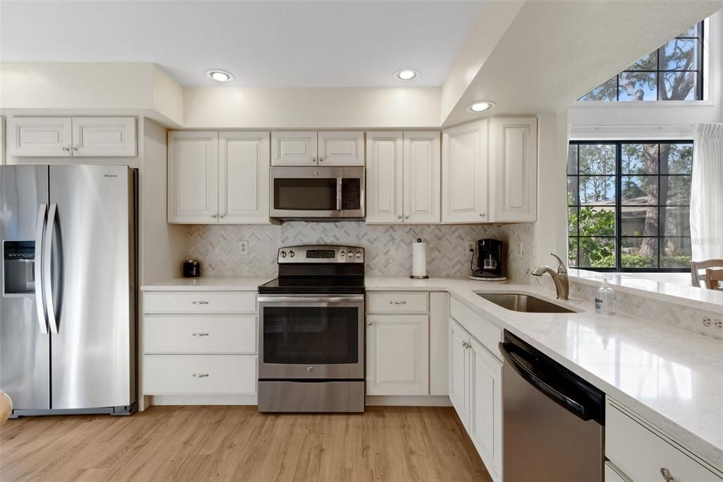 Interior, Kitchen, Recessed Lighting, Stainless Steel Appliances, Wood Texture Flooring