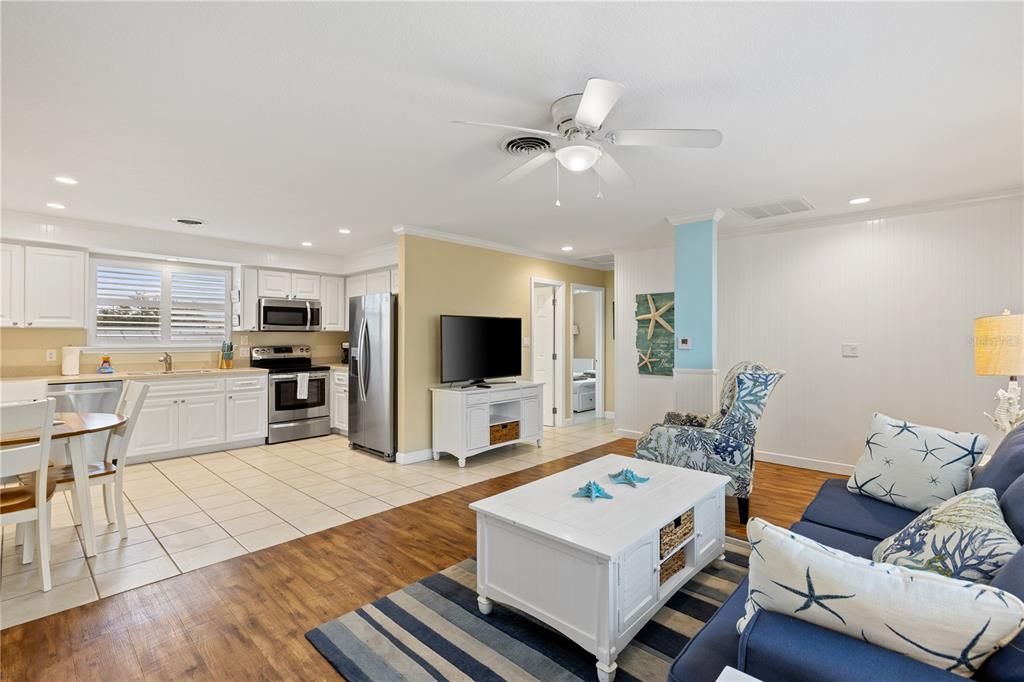 Dining room, Interior, Kitchen, Living room, Recessed Lighting, Stainless Steel Appliances, Wood Texture Flooring