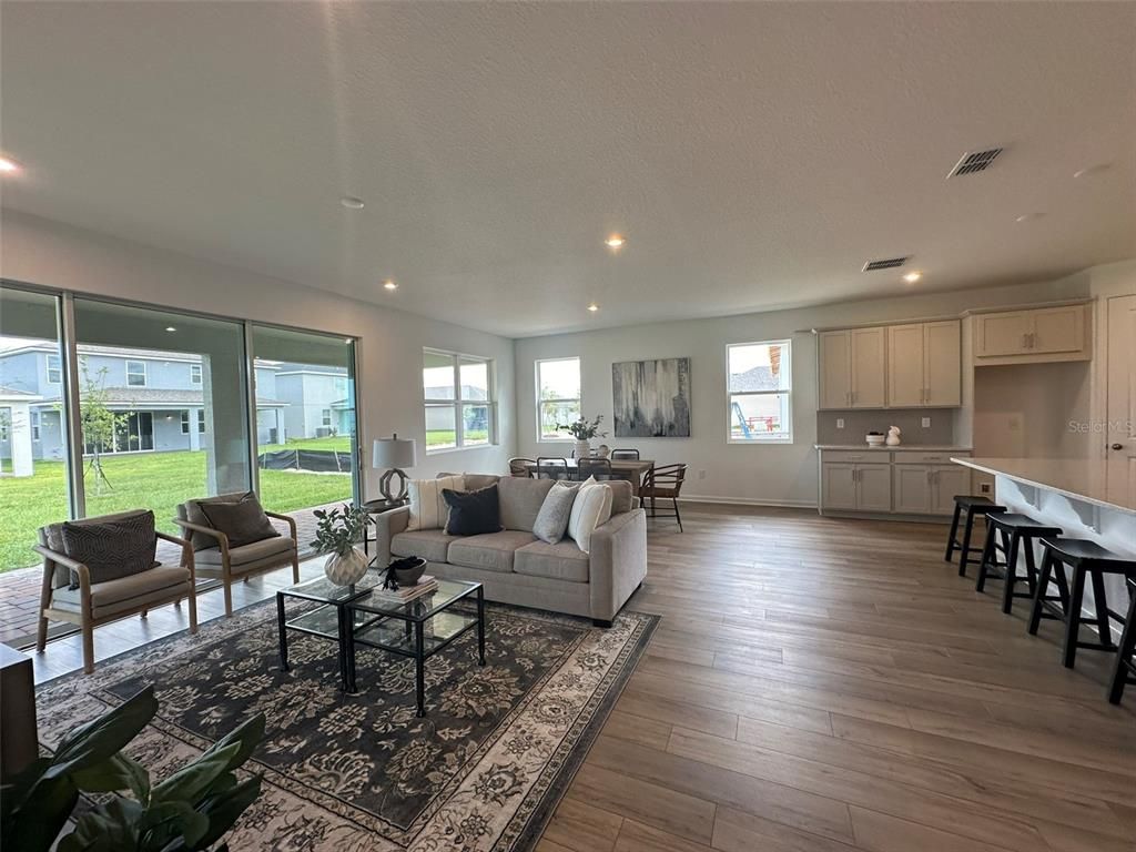 Dining room, Interior, Kitchen, Living room, Recessed Lighting, Wood Texture Flooring