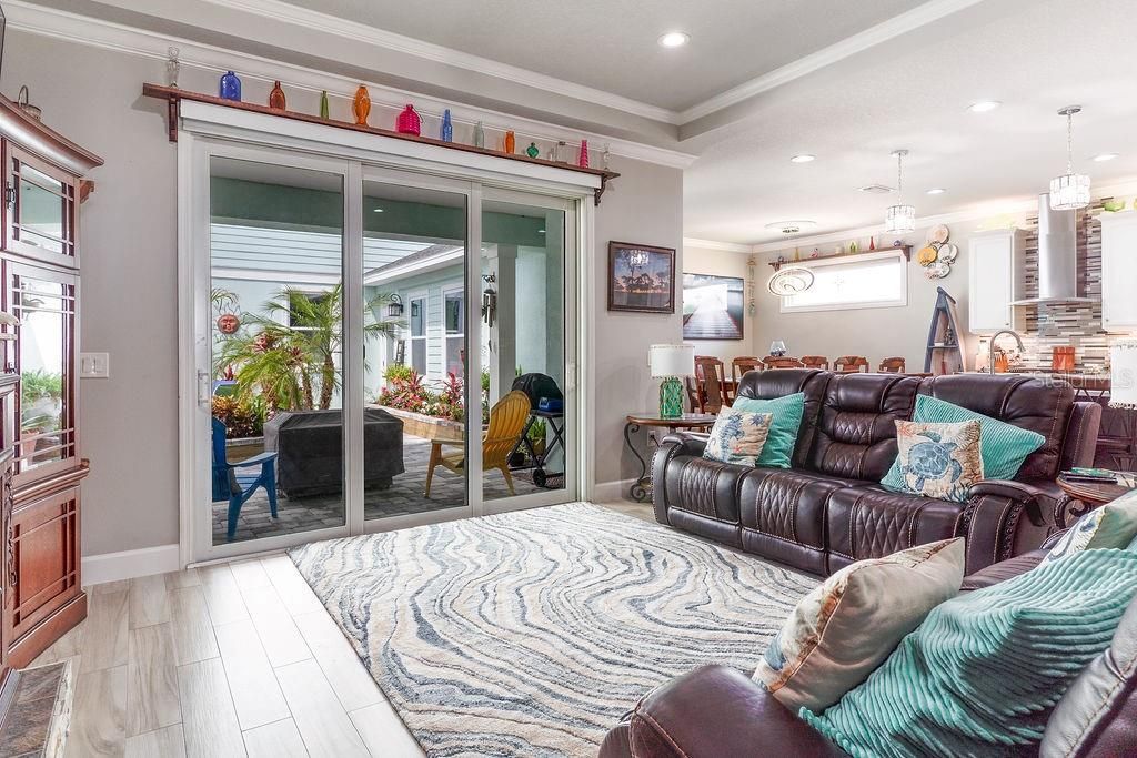 Dining room, Interior, Living room, Pendant Lights, Recessed Lighting, Wood Texture Flooring