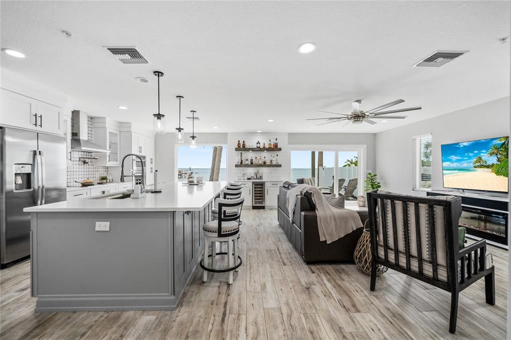 Interior, Kitchen, Living room, Pendant Lights, Recessed Lighting, Stainless Steel Appliances, Water, Wood Texture Flooring