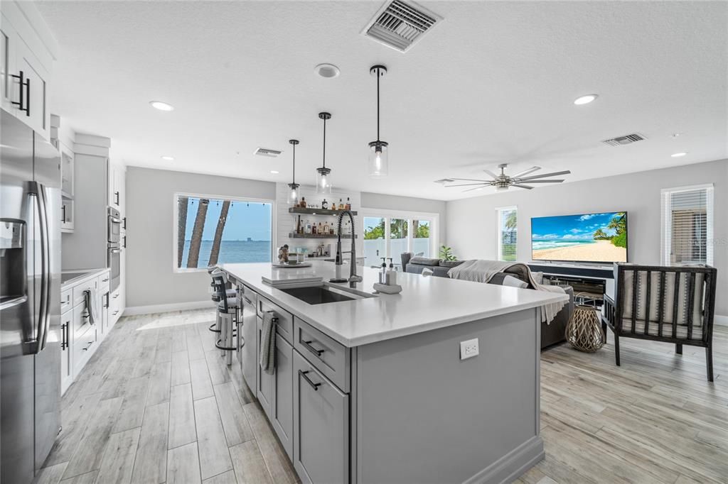 Interior, Kitchen, Living room, Pendant Lights, Recessed Lighting, Stainless Steel Appliances, Water, Wood Texture Flooring