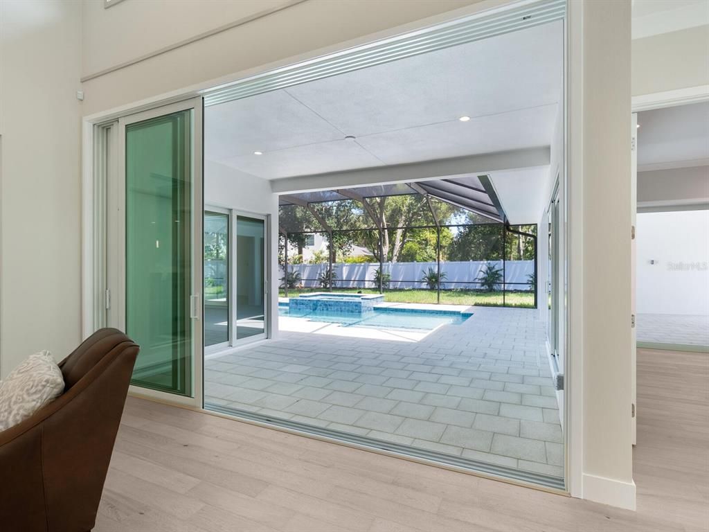 Interior, Pool, Recessed Lighting, Sun Room, Wood Texture Flooring