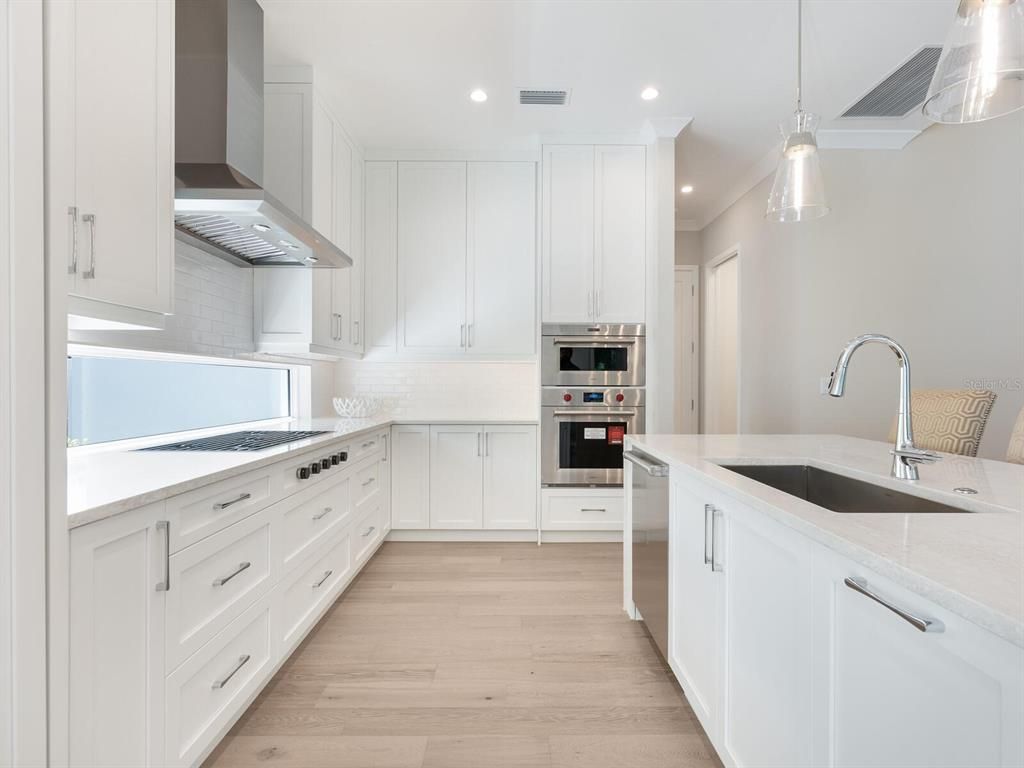 Interior, Kitchen, Pendant Lights, Recessed Lighting, Stainless Steel Appliances, Wood Texture Flooring