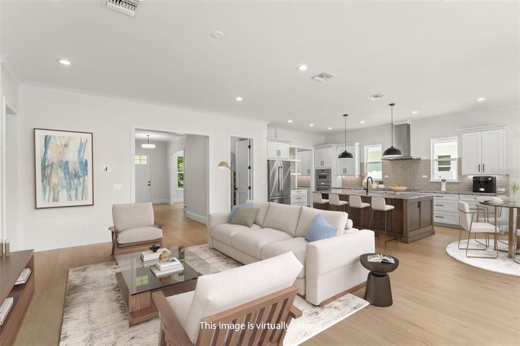 Dining room, Interior, Kitchen, Living room, Pendant Lights, Recessed Lighting, Stainless Steel Appliances, Wood Texture Flooring