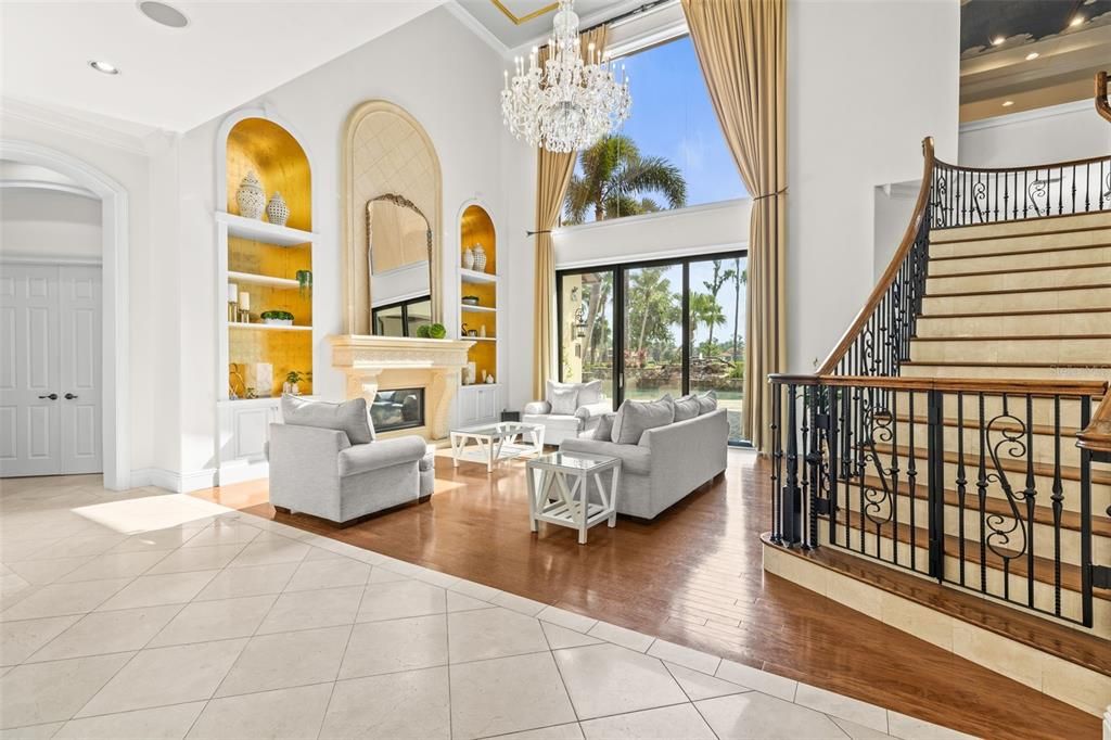 Chandelier, Fireplace, Interior, Living room, Recessed Lighting, Wood Texture Flooring