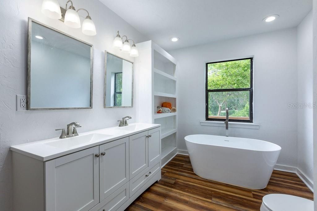 Bathroom, Dual Sink Vanities, Free Standing Baths, Interior, Recessed Lighting, Wood Texture Flooring