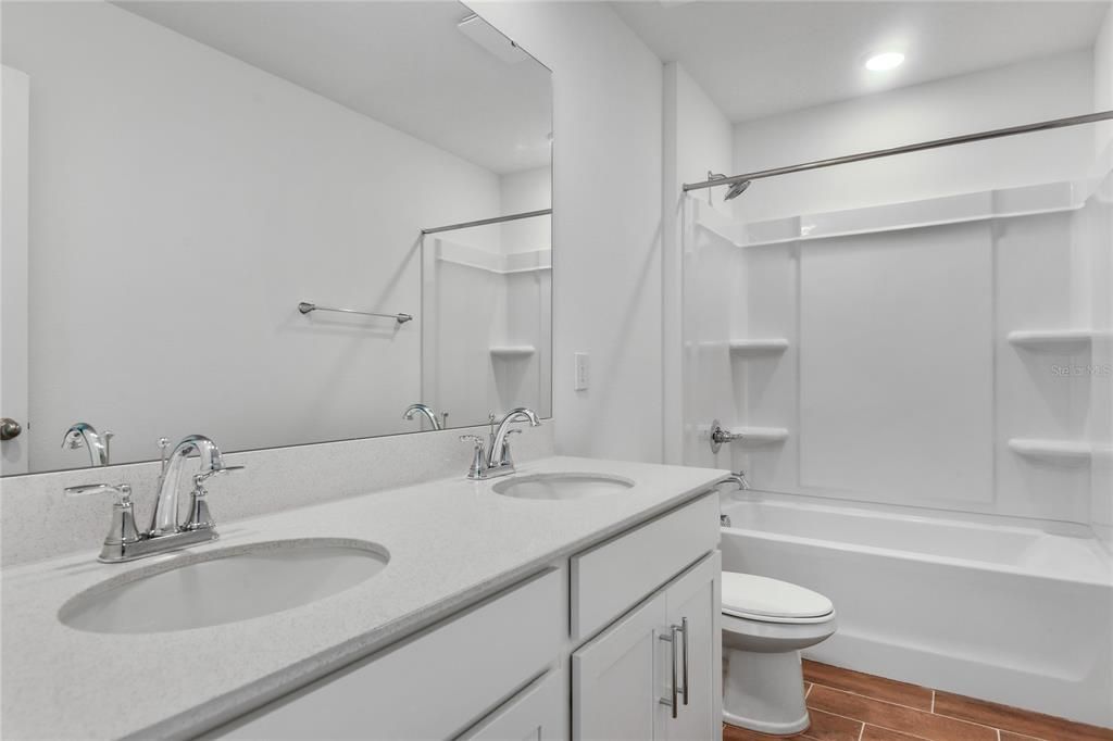 Bathroom, Dual Sink Vanities, Interior, Recessed Lighting, Wood Texture Flooring