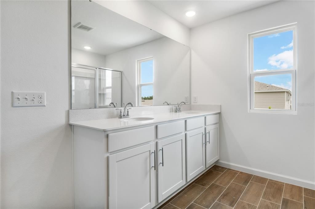 Bathroom, Dual Sink Vanities, Interior, Recessed Lighting, Wood Texture Flooring