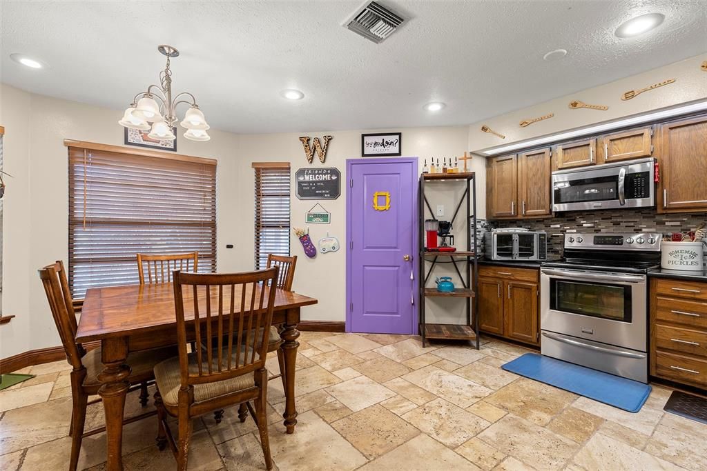 Chandelier, Dining room, Interior, Kitchen, Recessed Lighting, Stainless Steel Appliances