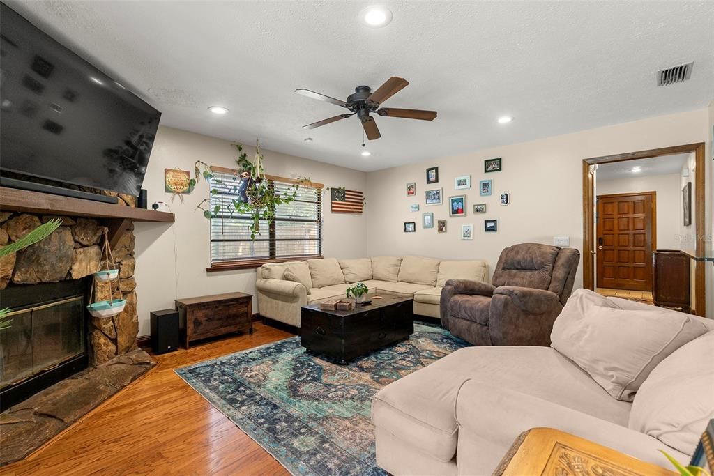 Fireplace, Interior, Living room, Recessed Lighting, Wood Texture Flooring