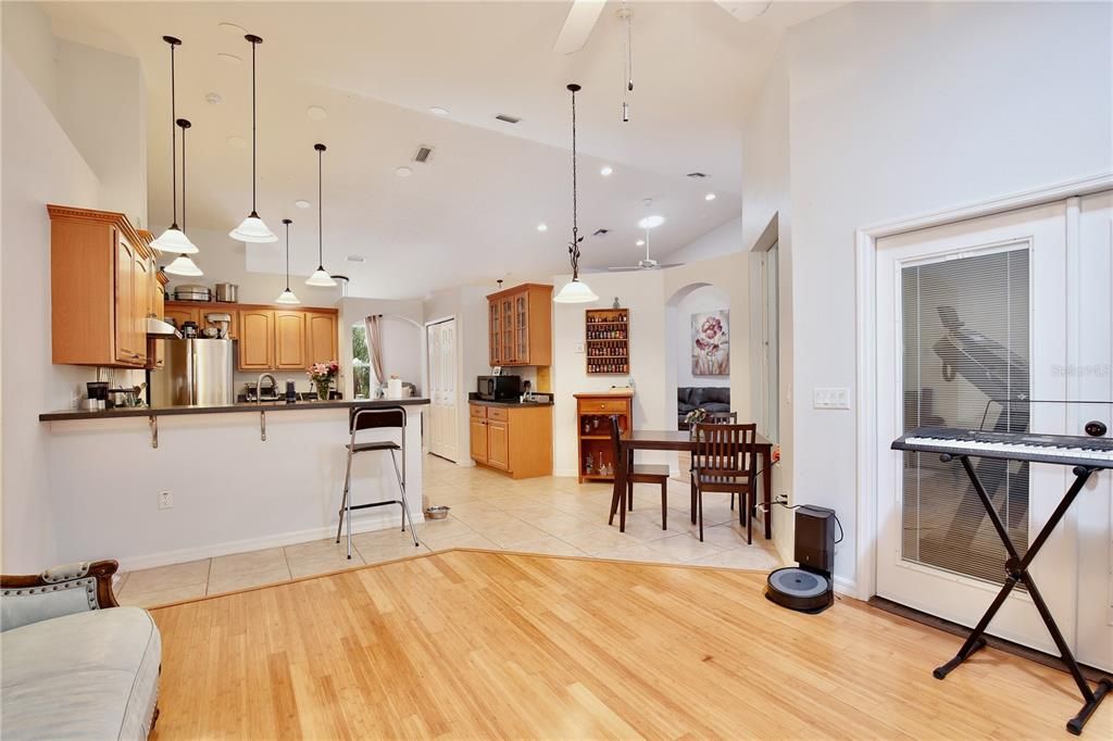 Dining room, Interior, Kitchen, Pendant Lights, Recessed Lighting, Stainless Steel Appliances, Wood Texture Flooring