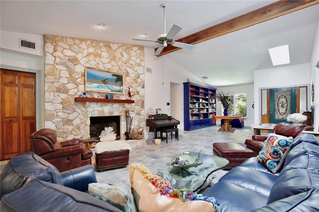 Fireplace, Interior, Living room, Piano, Recessed Lighting, Stone Walls, Wooden Beams