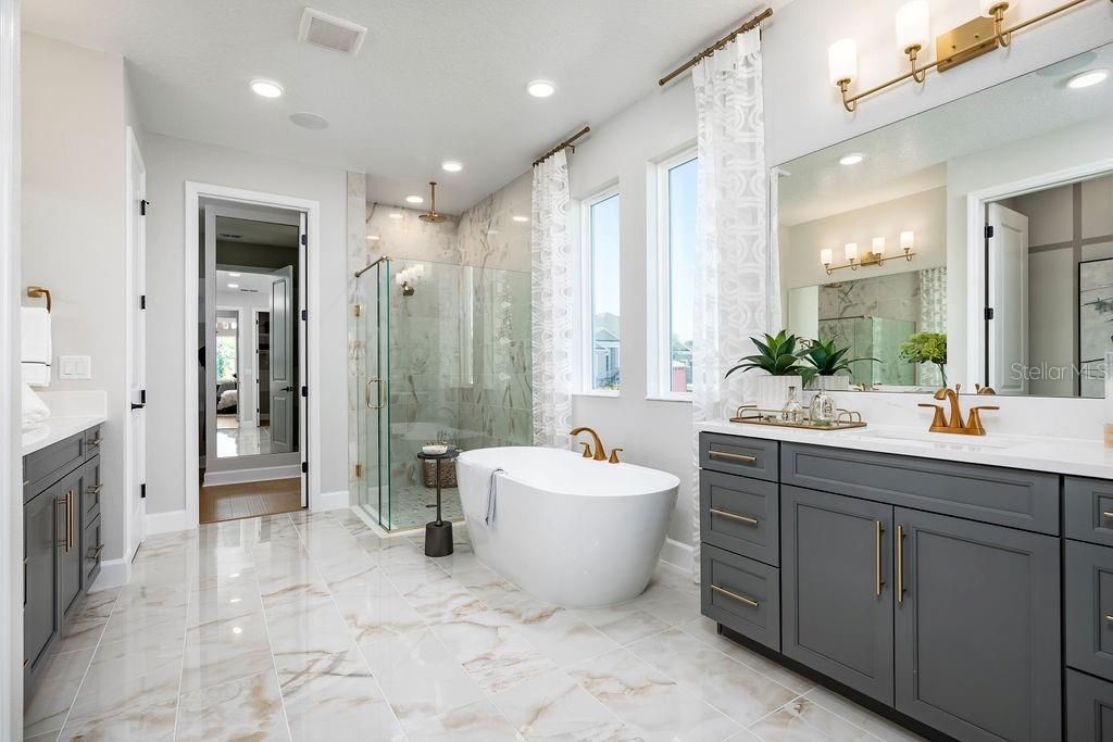 Bathroom, Dual Sink Vanities, Free Standing Baths, Glass Shower, Interior, Marble, Marble Walls, Recessed Lighting