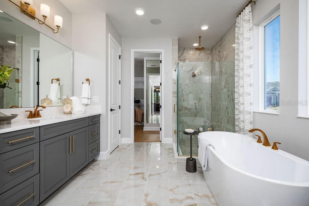 Bathroom, Dual Sink Vanities, Free Standing Baths, Glass Shower, Interior, Marble, Marble Walls, Recessed Lighting