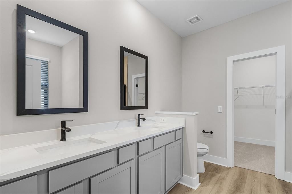 Bathroom, Dual Sink Vanities, Interior, Recessed Lighting, Wood Texture Flooring