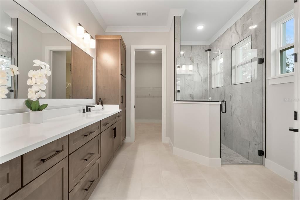Bathroom, Dual Sink Vanities, Glass Shower, Interior, Marble Walls, Recessed Lighting