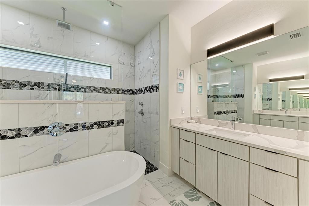 Bathroom, Dual Sink Vanities, Free Standing Baths, Interior, Marble, Marble Walls, Recessed Lighting