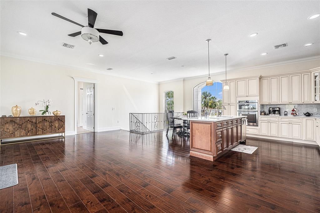 Dining room, Interior, Kitchen, Pendant Lights, Recessed Lighting, Stainless Steel Appliances, Wood Texture Flooring