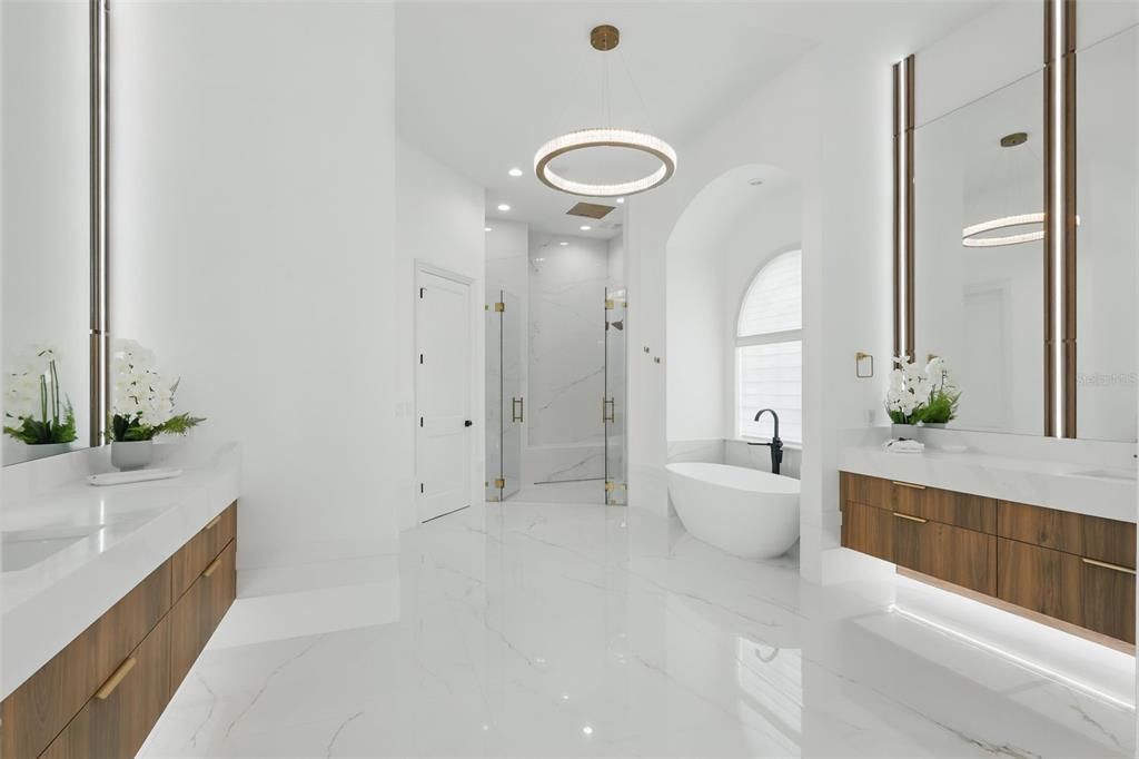 Bathroom, Dual Sink Vanities, Free Standing Baths, Glass Shower, Interior, Marble, Marble Walls, Pendant Lights, Recessed Lighting