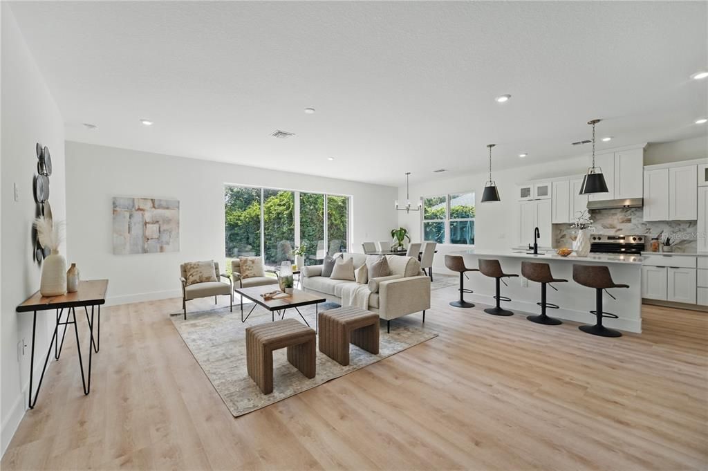 Dining room, Interior, Kitchen, Living room, Pendant Lights, Recessed Lighting, Stainless Steel Appliances, Wood Texture Flooring