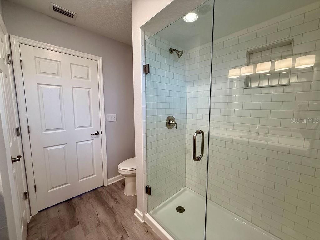 Bathroom, Glass Shower, Interior, Recessed Lighting, Wood Texture Flooring