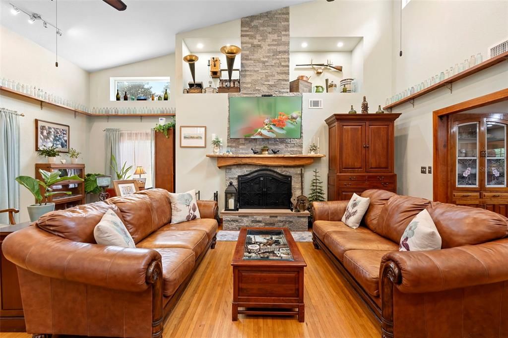 Fireplace, Interior, Living room, Recessed Lighting, Stone Walls, Wood Texture Flooring