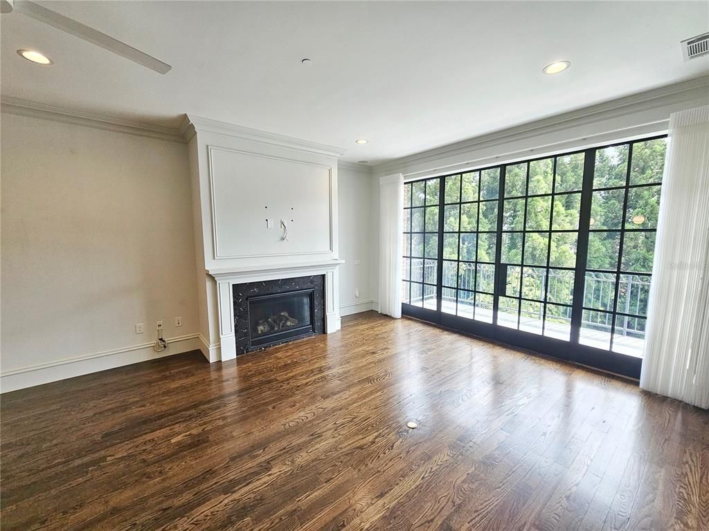 Empty room, Fireplace, Interior, Recessed Lighting, Wood Texture Flooring